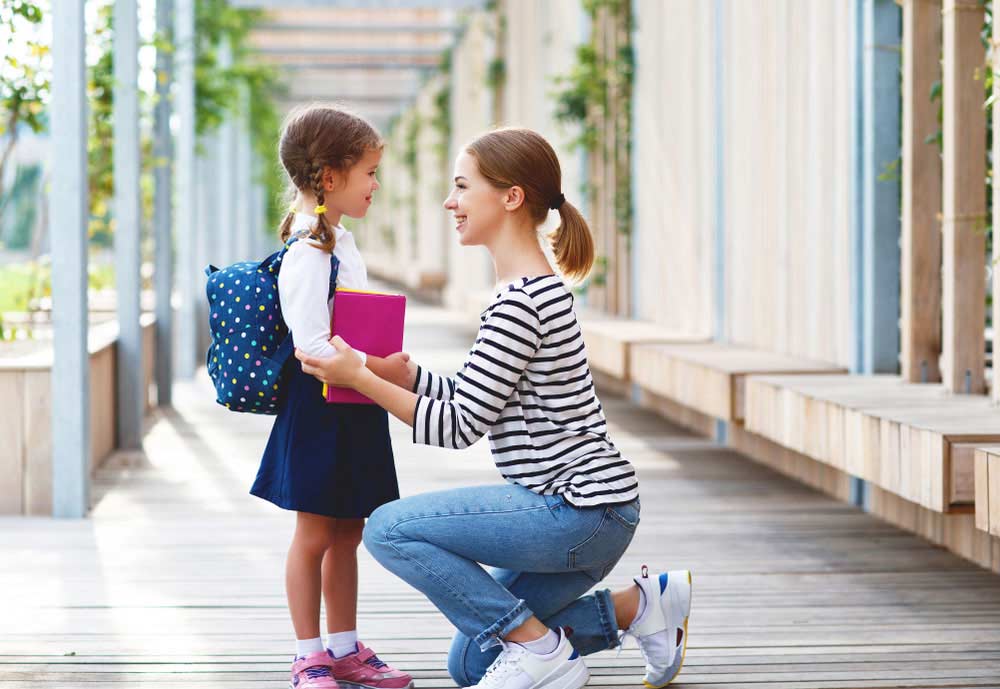parent with daughter at school
