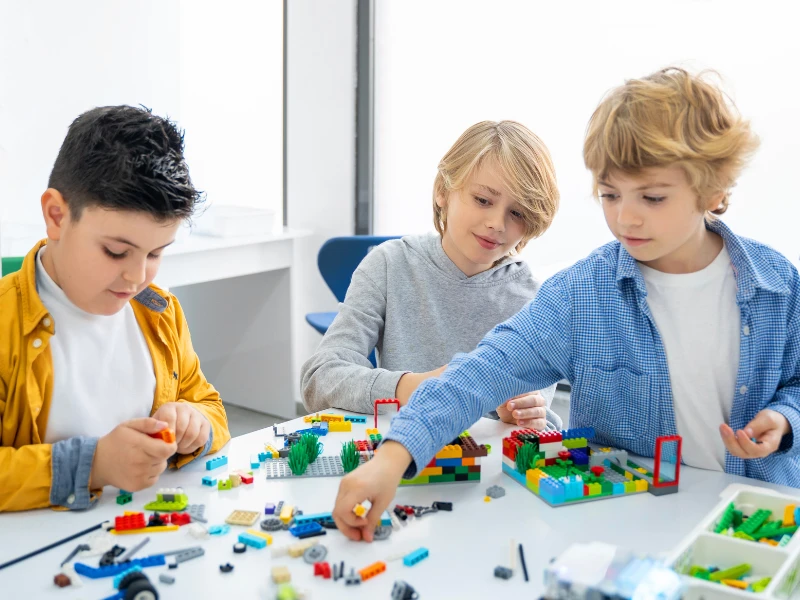 Children building with lego
